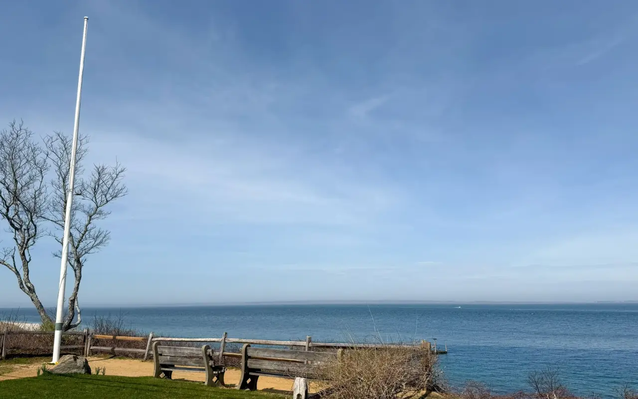 Benches and a flagpole at the West Chop overlook above Vineyard Sound