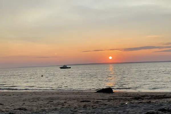 Sunset over the rock at Lambert's Cove