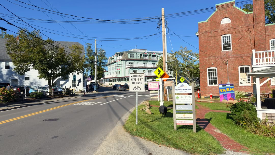 Looking down Main Street in Vineyard Haven on a clear fall morning, the old brick building with its...