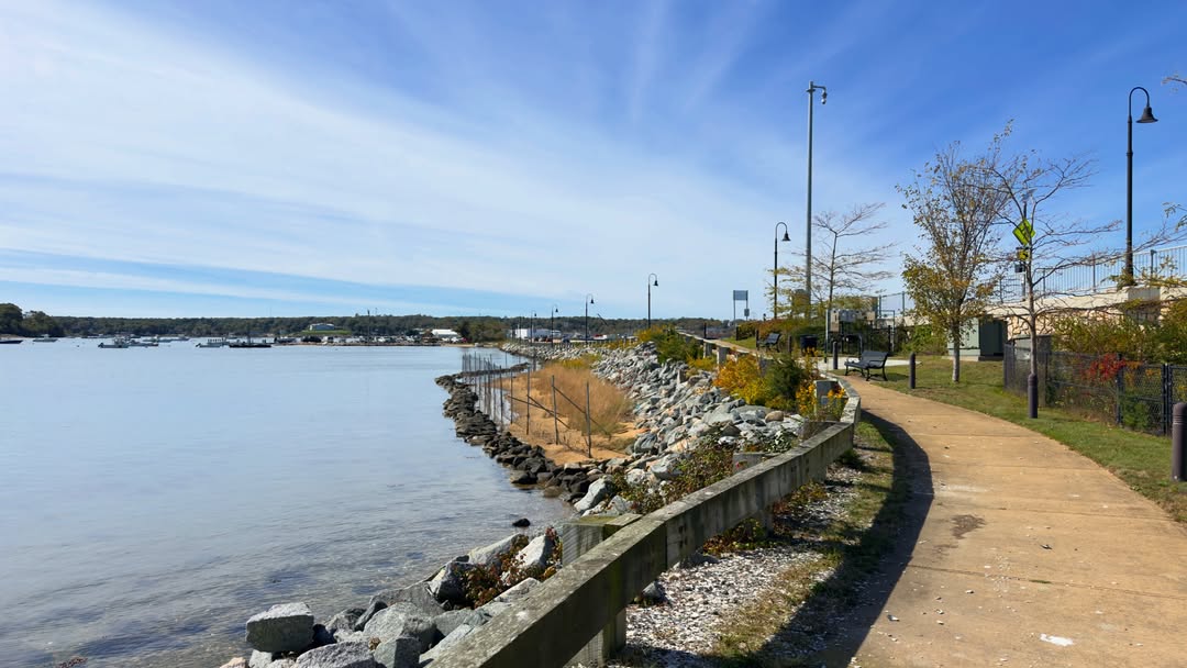 The walk beside the Lagoon Pond drawbridge in Vineyard Haven on a sunny October day, the water calm...