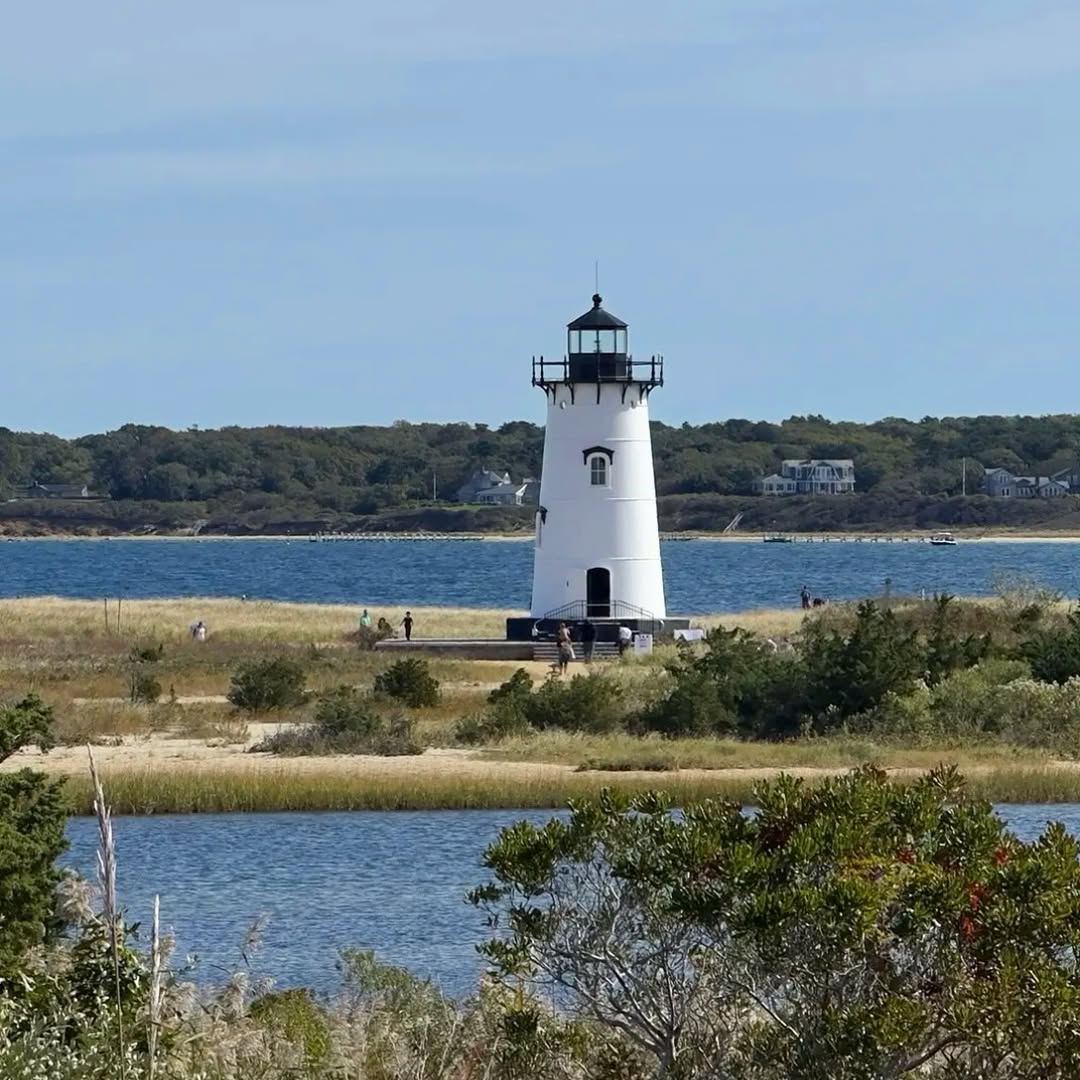 Edgartown Lighthouse from across the marsh this October. The white tower stands at the mouth of Edga...