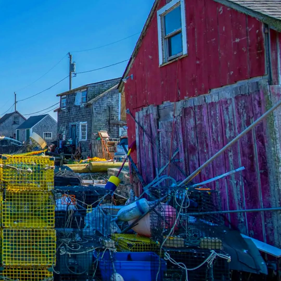 Lobster traps, buoys and a red fish shack on the dock in Menemsha, the fishing village in Chilmark w...