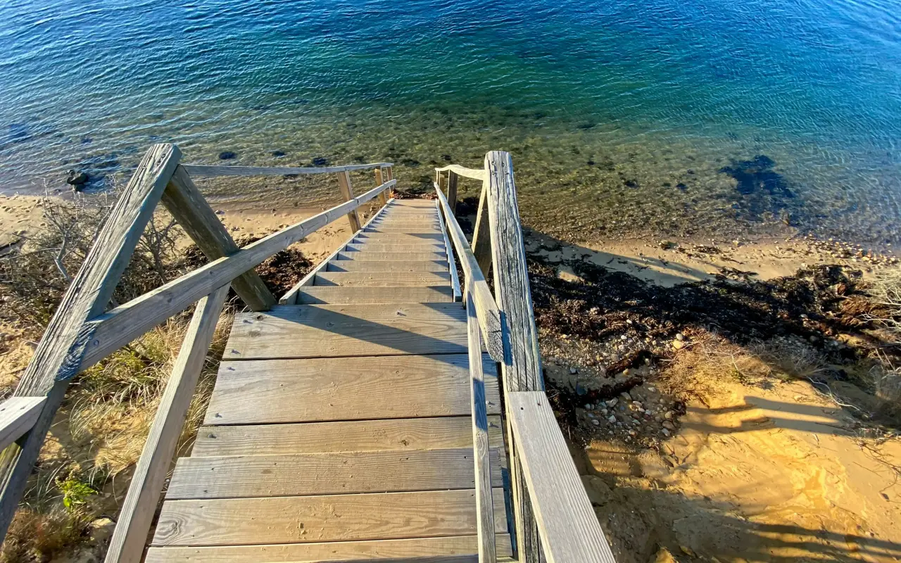 Wooden steps leading down to a quiet Chappaquiddick beach