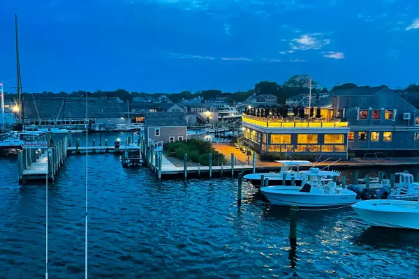 Edgartown waterfront restaurant lit up on a summer night