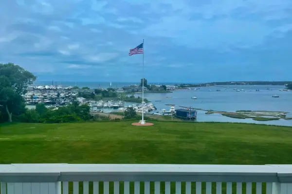 American flag on the Martha's Vineyard Museum lawn overlooking the harbor