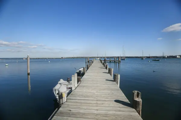 Wooden pier stretching into Vineyard Haven harbor